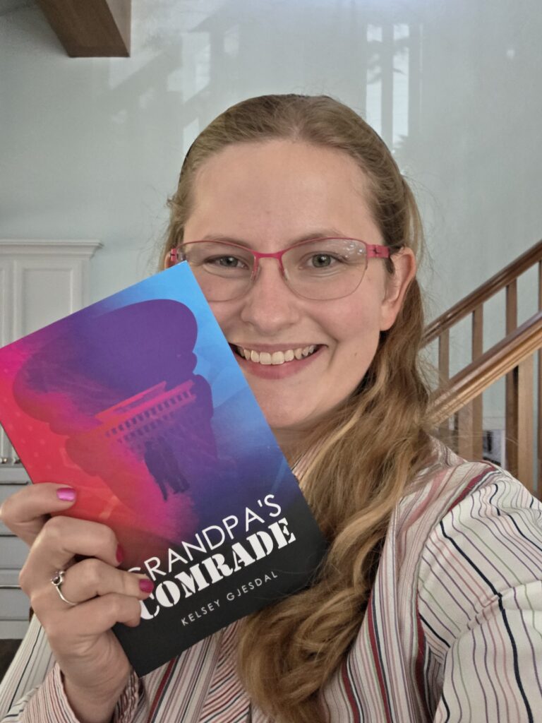 me holding my new book